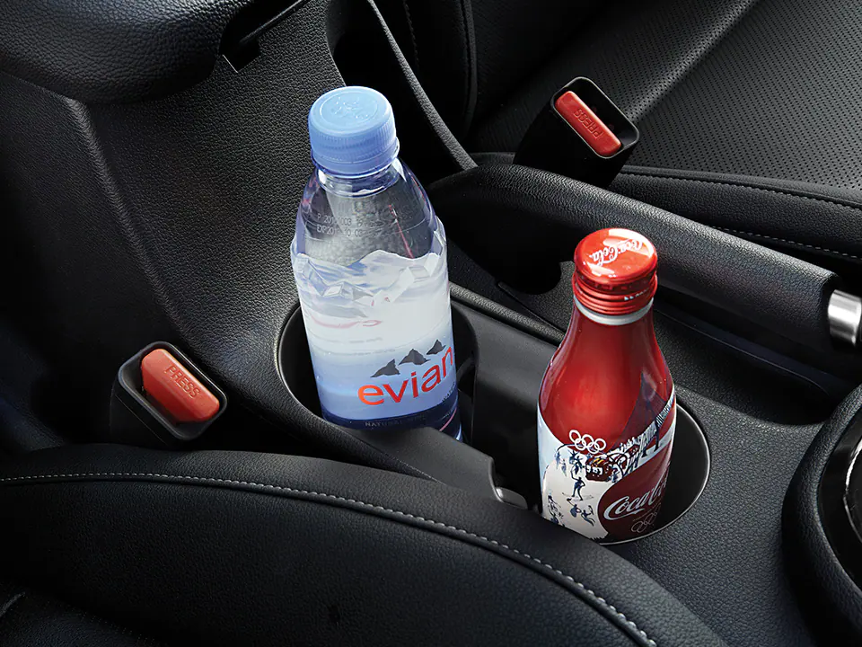 Floor console cup holders